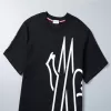 Moncler Oversized Logo Cotton T-Shirt in Black - luxurydeal