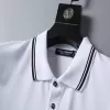 Dolce & Gabbana logo stripe-trim polo shirt - luxurydeal