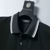 Dolce & Gabbana logo stripe-trim polo shirt - luxurydeal